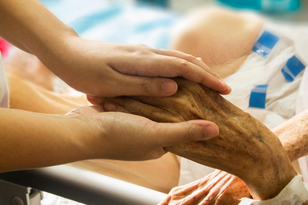 Hand In Hand Hospice Patient - truthseeker08 / Pixabay